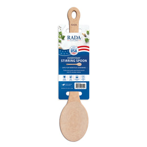 Rada's wooden Everyday Stirring Spoon in its original retail packaging, featuring a light natural wood spoon head and a blue and white paper label.