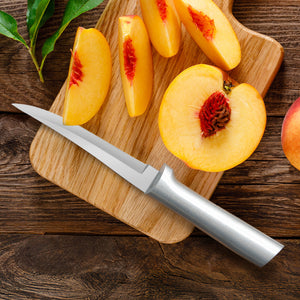 Sliced peaches on a wooden cutting board with a knife