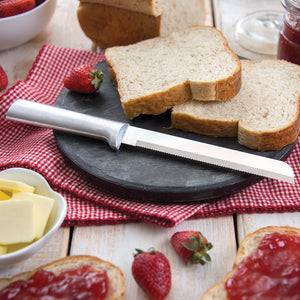 6" Bread knife with silver handle for slicing homemade bread.