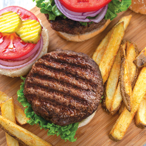 Burger & Fry Seasoning on hamburger on a bun with condiments & served with French fries.