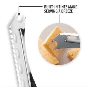 Built-in tines make serving a breeze. Close-up of the forked end of the cheese knife piercing a slice of cheese.