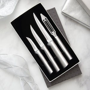 Meal Prep Gift Set with silver handles with three knives and vegetable peeler in gift box.