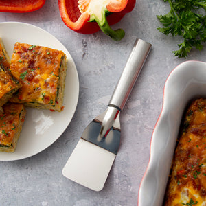 Rada's Silver Handle Mini Server next to pieces of egg bake and a pepper cut in half.