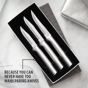 An open gift box with three silver handled Rada paring knives. Because you can never have too many paring knives.