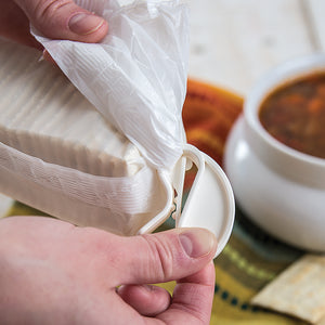 Securing a bag of saltine crackers with a Rada Quick Grip Clip.