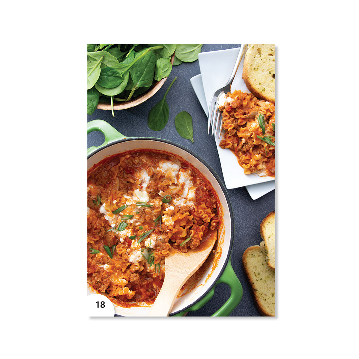 One Pot Lasagna with spinach salad and bread on the side.