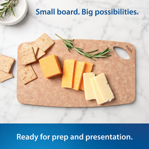 Rada's Small Prep Board shown on a white marble surface with crackers, cheese, and rosemary. Blue text at the bottom reads 'Ready for prep and presentation.'