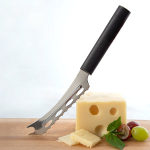 Black Handle Cheese Knife with a block of cheese and grapes on a wooden board