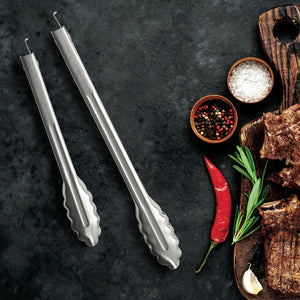 9" and 12" Rada Cutlery tongs with steak on a cutting board, and spices on the side.
