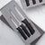 Rada Cutlery Anthem Slice & Pare Set showing knives with black handles in gift box. 