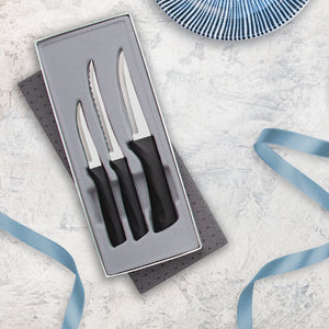 Anthem Wave Series Super Parer, Tomato Slicer and Heavy Duty Paring in a gift box with a blue ribbon and dish accent.