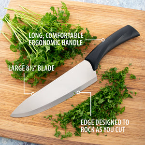 French Chef on cutting board. Long, comfortable, ergonomic handle. Large 8 1/2 inch blade. Edge designed to rock as you cut.