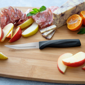Rada Cutlery Anthem Wave handle Heavy Duty Paring Knife on wooden cutting board with sliced food