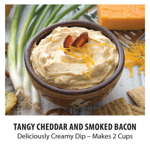 Dip surrounded by cheese, green onions and crackers. Tangy cheddar and smoked bacon. Deliciously Creamy Dip. Makes 2 cups.