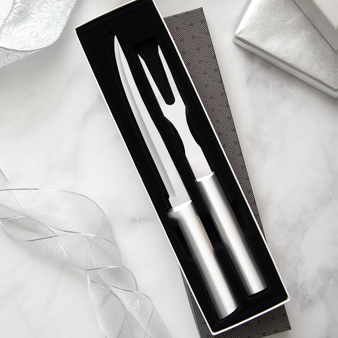 Rada Cutlery Carving Gift Set with silver handles in a black-lined gift box. 