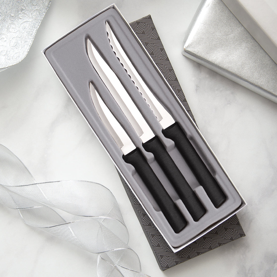 3-piece Cooking Essentials Gift Set with silver handles in a black-lined gift box