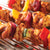 Jamaican Jerk Marinade shown on chicken and vegetable kabobs. 