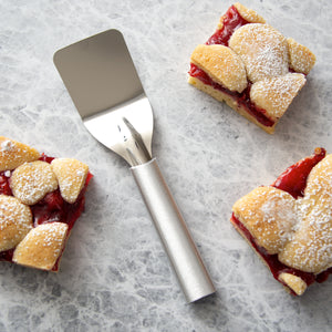 Mini Server with silver handle with cherry bars dessert. 