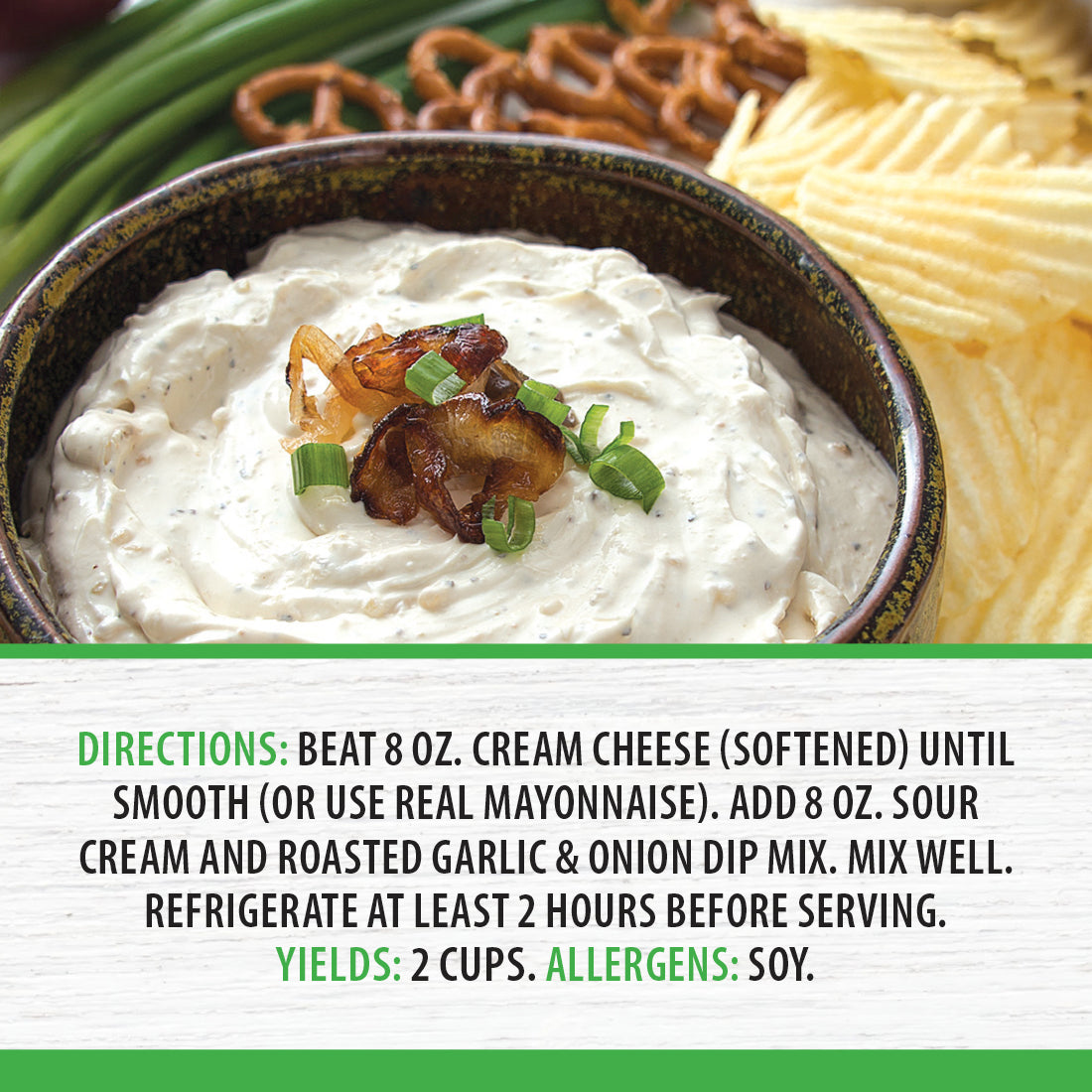Roasted Garlic and Onion Dip mixed with sour cream and cream cheese, beside chips and pretzels. 