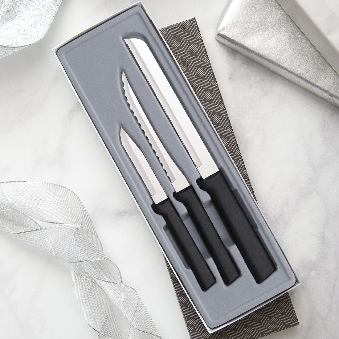 Rada Cutlery's Sensational Serrations Gift Set with silver handles in a black-lined gift box. 