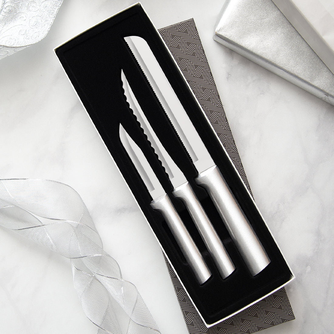 Rada Cutlery's Sensational Serrations Gift Set with silver handles in a black-lined gift box. 