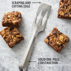 The Rada Cutlery Serverspoon with squares of chunky brownies. Scraping and cutting edge. solid one-piece construction. 