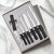 The Starter Gift Set Part 2 with silver handles -- seven knives in a gift box. 